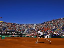 Acción del partido entre Isner y almagro en Gijón. AP  /