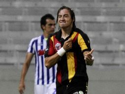 El jugador de la UdeG, Christian López celebra el primer gol del conjunto universitario. MEXSPORT  /