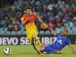 Lionel Messi entró al juego para darle rumbo a la victoria del Barcelona. AP  /