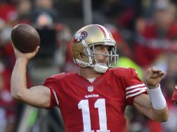 Alex Smith completó 20 de 31 pases para 226 yardas y alargó la marca de equipo de envíos sin interceptar hasta los 216. EFE  /