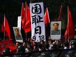 Manifestantes chinos protestan contra las medidas japonesas en el conflicto territorial. AP  /