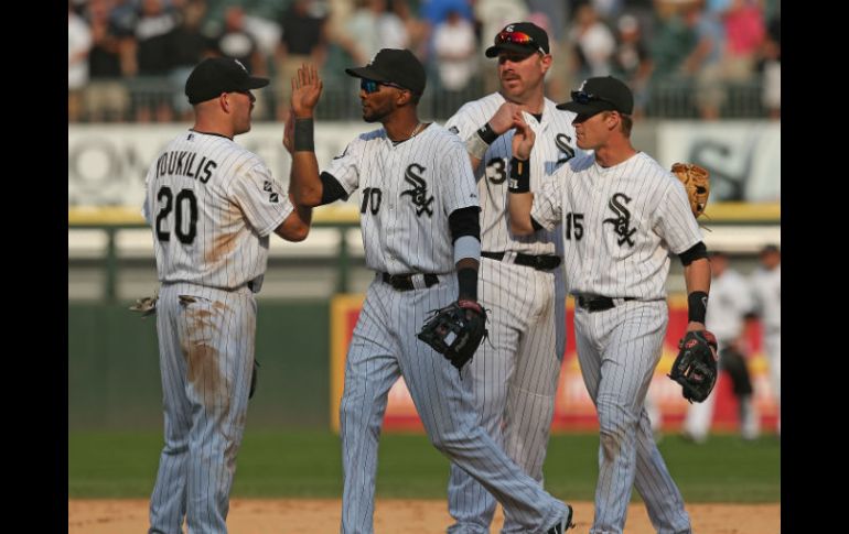 Jugadores de los Medias Blancas de Chicago celebra la victoria sobre los Tigres de Detroit. AFP  /