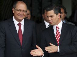 Enrique Pena Nieto conversa con el Gobernador de Sao Paulo. REUTERS  /