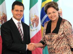 La jefa de Estado de Brasil, Dilma Rousseff, recibe a Enrique Peña Nieto en el Palacio del Planalto en Brasilia. AP  /