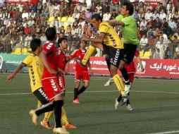 Partido inaugural disputado  por los combinados de Maiwand Atalan y Shayeen Asmayee. EFE  /