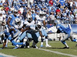Los Leones empataron el partido en el último segundo del último cuarto pero perdieron en tiempo extra. AP  /