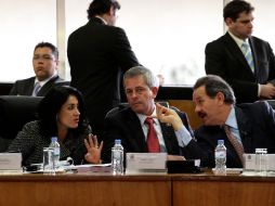 Los legisladores Karina Labastida, Marcelo de Jesús Torres y Juan Bueno Torio, durante la sesión de la Comisión del Trabajo. NTX  /
