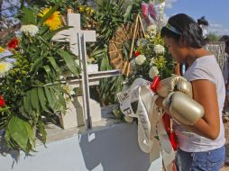 Deudos se despiden de sus seres queridos. (ARCHIVO)  /