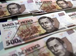 En cuanto a la base monetaria, el banco central agrega que ésta se ubicó en 738.1 mil millones de pesos. ARCHIVO  /