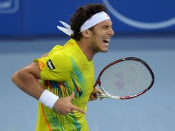 Juan Mónaco, de Argentina, celebra tras vencer a Kei Nishikori. AFP  /