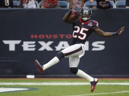 Kareem Jackson regreso una intercepción para anotación en el partido. AP  /