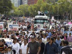 Marchan trabajadores del STUNAM e integrantes de #YoSoy132. EL UNIVERSAL  /