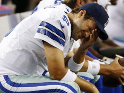 Tony Romo tuvo una mala noche ante los Osos de Chicago. AP  /