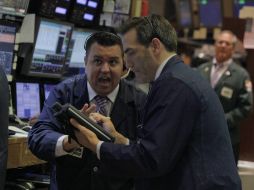 El Dow Jones de Industriales, se mostró animado por el buen desempeño del sector financiero. ARCHIVO  /