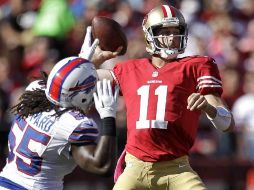 Alex Smith (11) tuvo su mejor actuación de la temporada con 303 yardas. AP  /