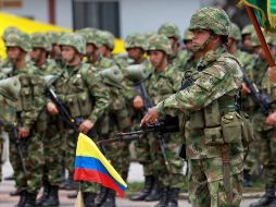 El Gobierno colombiano y las FARC iniciarán así su tercer proceso de paz en los casi 50 años de conflicto armado. ARCHIVO  /