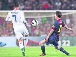 Los mejores. Ronaldo y Messi deleitaron al mundo entero con su clase y elegancia, parecía que ninguno quería ser opacado por el otro.AP  /