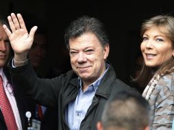 Santos, de 61 años y en el poder desde agosto de 2010, afirmó que ya está completamente curado. AP  /