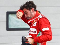 El piloto español de Fórmula Uno Fernando Alonso, de Ferrari, tras la clasificación en el circuito de Yeongam en Corea del Sur. EFE  /