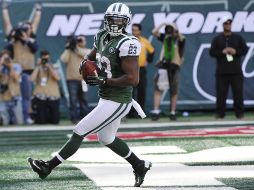 Shonn Greene alcanzo 161 yardas y tres anotaciones en el partido. AP  /