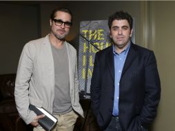 El productor ejecutivo, Brad Pitt y el escritor y director de ''The House I Live In'', Eugene Jarecki. AP  /