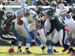 Matthew Stafford (9) fue la figura para los Leones. AP  /