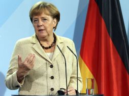 Merkel afirma que se adoptarán las decisiones ''precisas'' para evitar un ''proceso descontrolado''.EFE  /