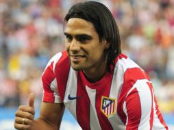 El técnico argentino destacó el carácter y la entrega del delantero colombiano. ESPECIAL  /