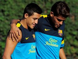 Dos Santos (d) rechazó convocatorias al Tricolor para mostrar su compromiso y ganas de seguir con el Barça. ARCHIVO  /