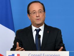 La zona euro ya no se plantea una posible salida de Grecia de la moneda única, aseguró Hollande. AFP  /