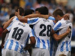 El equipo del Málaga celebra una de sus anotaciones contra el Valladolid en el partido de la octava jornada. REUTERS  /