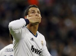 El delantero del Real Madrid, Cristiano Ronaldo, celebra su gol ante el Celta de Vigo, durante el partido de la octava jornada. EFE  /