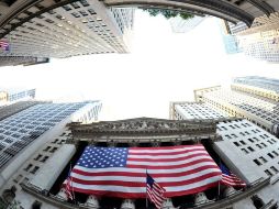 El Dow Jones cerró la sesión con pérdida de 243.36 unidades a 13 mil 102.53. ARCHIVO  /
