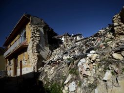El sismo en L'Aquila dejó un saldo de más de 300 muertos, además de daños a edificios. AFP  /