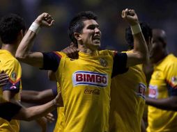 Jesús Molina festeja el gol de la victoria del América. MEXSPORT  /