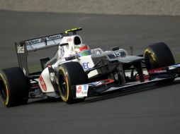 Pérez abandonó la carrera después de sufrir un pinchazo en una rueda. EFE  /