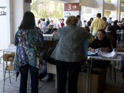 Son las primeras elecciones con voto voluntario y donde se registraba una baja participación. AFP  /