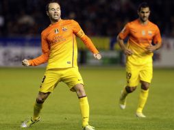 Iniesta celebrá uno de los goles en el partido. AFP  /