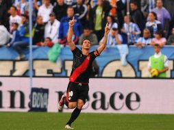 El ''Piti'' celebra una de sus anotaciones en el duelo ante el Málaga. AFP  /