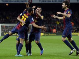 Adriano (i) anotó el primer gol para el Barcelona en el duelo ante el Celta de Vigo. AP  /