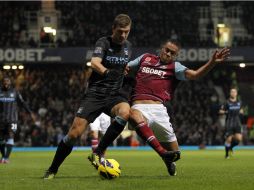 Los 'citizens' desaprovecharon la opción de superar en la tabla al Chelsea, y quedan terceros en la tabla con 22 puntos. AP  /