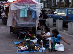 Los comercios pagan alrededor de 6.5 pesos por metro cuadrado, en impuestos al Ayuntamiento. ARCHIVO  /