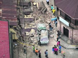 Pérdidas materiales. El terremoto dejó graves daños a casas y edificios. AP  /