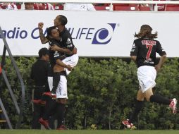 Los Xolos festejan el primer gol del partido que se dio a los 10 segundos de juego. MEXSPORT  /