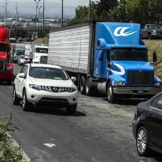 Transportistas esperan rutas alternas a Lázaro Cárdenas