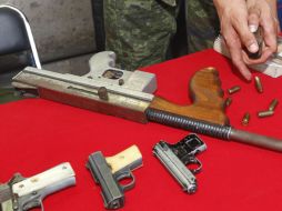 En el país hondureño circulan entre 800 mil y un millón de armas, de ellas muchas ilegales. ARCHIVO  /