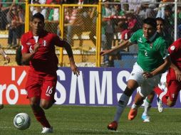 Mariño (i) ya está confirmado como refuerzo de los Gallos Blancos, sólo falta decidir el precio del fichaje. ESPECIAL  /