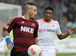 El empate coloca al Múnich con 8 puntos más que el Schalke 04, quien perdió 2-0 contra el Leverkusen. AP  /