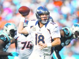 El hombre récord. Peyton Manning va por otra marca de la NFL, ante los Cargadores de San Diego. GETTY IMAGES SPORTS  /