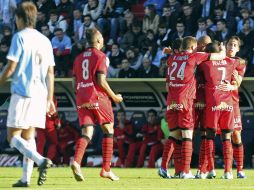 Los jugadores del Mallorca celebrando su primer gol ante el Celta de Vigo. EFE  /
